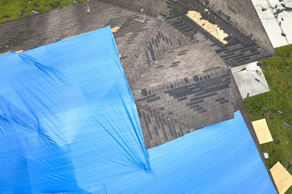 Storm Damage Roof Tarping in Enfield
